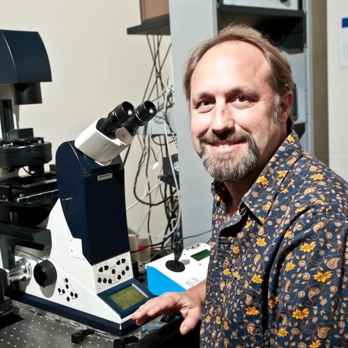 David Ehrhardt at a microscope.